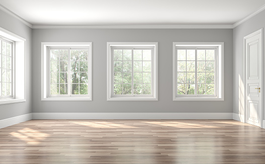 Classical empty room interior 3d render,The rooms have wooden floors and gray walls ,decorate with white moulding,there are white window looking out to the nature view.